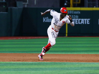 Aristides Aquino #56 of Diablos Rojos runs back to second base during match 1 against Sultanes de Monterrey of the Mexican Baseball League (...