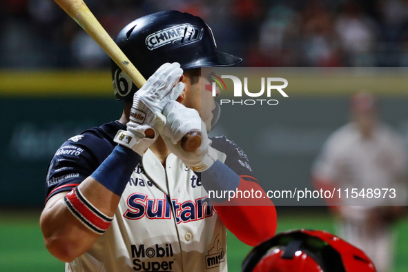 Christian Villanueva #14 of Sultanes de Monterrey bats during match 1 against Diablos Rojos of the Mexican Baseball League (LMB) Serie del R...