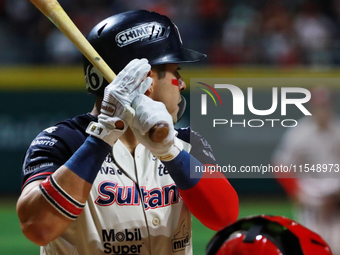 Christian Villanueva #14 of Sultanes de Monterrey bats during match 1 against Diablos Rojos of the Mexican Baseball League (LMB) Serie del R...