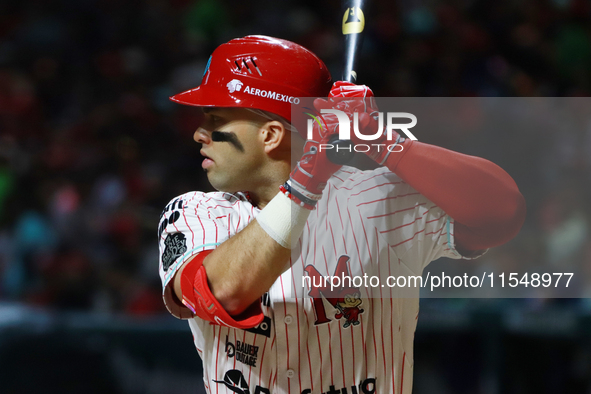 Jose Marmolejos #46 of Diablos Rojos bats during match 1 against Sultanes de Monterrey of the Mexican Baseball League (LMB) Serie del Rey at...