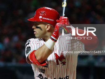 Jose Marmolejos #46 of Diablos Rojos bats during match 1 against Sultanes de Monterrey of the Mexican Baseball League (LMB) Serie del Rey at...