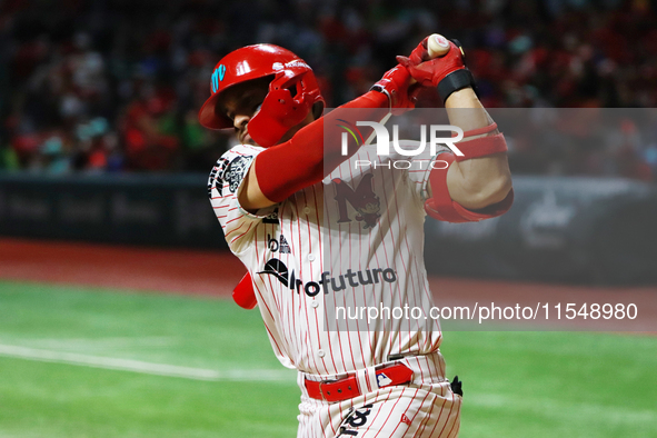 Franklin Barreto #43 of Diablos Rojos bats during match 1 against Sultanes de Monterrey of the Mexican Baseball League (LMB) Serie del Rey a...