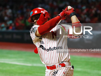 Franklin Barreto #43 of Diablos Rojos bats during match 1 against Sultanes de Monterrey of the Mexican Baseball League (LMB) Serie del Rey a...