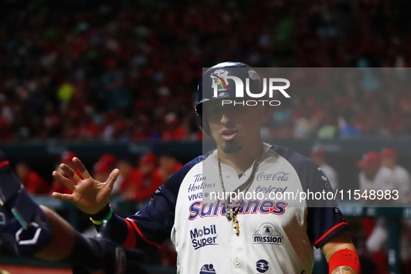 Ramiro Pena #1 of Sultanes de Monterrey celebrates during match 1 against Diablos Rojos of the Mexican Baseball League (LMB) Serie del Rey a...