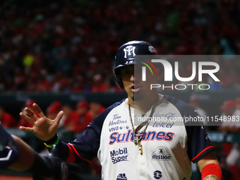 Ramiro Pena #1 of Sultanes de Monterrey celebrates during match 1 against Diablos Rojos of the Mexican Baseball League (LMB) Serie del Rey a...