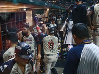 Ramiro Pena #19 of Sultanes de Monterrey celebrates after his run score at the dugout during match 1 against Diablos Rojos of the Mexican Ba...