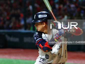 Ramiro Pena #19 of Sultanes de Monterrey bats during match 1 against Diablos Rojos of the Mexican Baseball League (LMB) Serie del Rey at the...