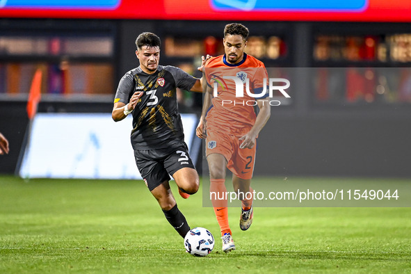 North Macedonia player Gjorge Djekov and Netherlands player Devyne Rensch during the match between the Netherlands and North Macedonia at th...