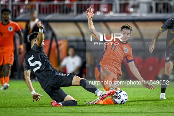 North Macedonia player Reshat Ramadani and Netherlands player Ruben van Bommel during the match between Netherlands and North Macedonia at t...