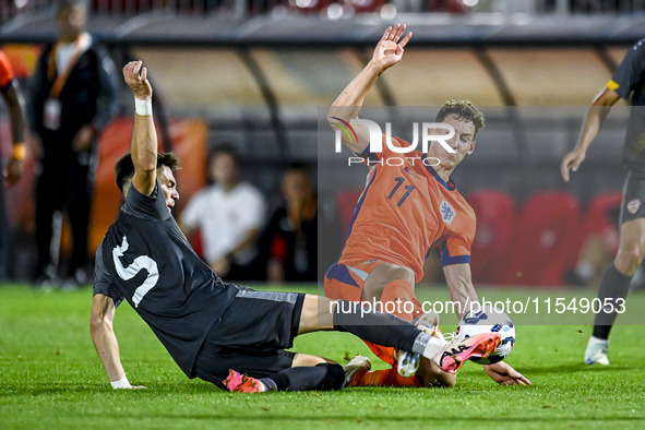 North Macedonia player Reshat Ramadani and Netherlands player Ruben van Bommel during the match between Netherlands and North Macedonia at t...