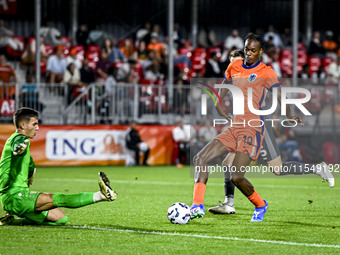 North Macedonia goalkeeper Marko Alchevski and Netherlands player Emmanuel Emegha during the match between the Netherlands and North Macedon...