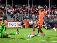 North Macedonia goalkeeper Marko Alchevski and Netherlands player Emmanuel Emegha during the match between the Netherlands and North Macedon...