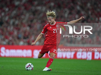 Morten Hjulmand of Denmark shoots on goal during the UEFA Nations League 2024/2025 League A - Group 4 match between Denmark and Switzerland...