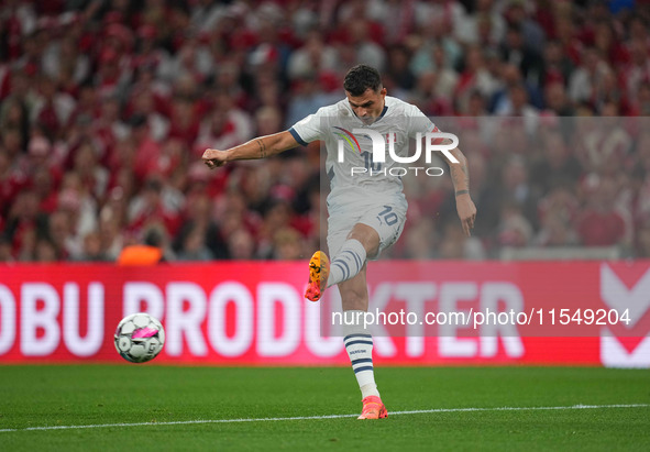 Granit Xhaka of Switzerland  in action during the UEFA Nations League 2024/2025 League A - Group 4 match between Denmark and Switzerland at...