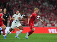 Kasper Dolberg of Denmark and Manuel Akanji of Switzerland battle for the ball during the UEFA Nations League 2024/2025 League A - Group 4 m...