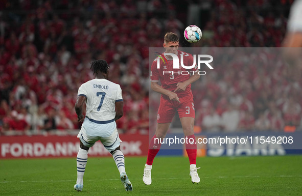 Jannik Vestergaard of Denmark  heads during the UEFA Nations League 2024/2025 League A - Group 4 match between Denmark and Switzerland at Pa...