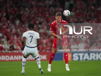 Jannik Vestergaard of Denmark  heads during the UEFA Nations League 2024/2025 League A - Group 4 match between Denmark and Switzerland at Pa...