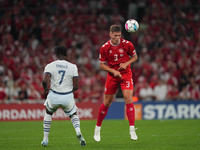 Jannik Vestergaard of Denmark  heads during the UEFA Nations League 2024/2025 League A - Group 4 match between Denmark and Switzerland at Pa...