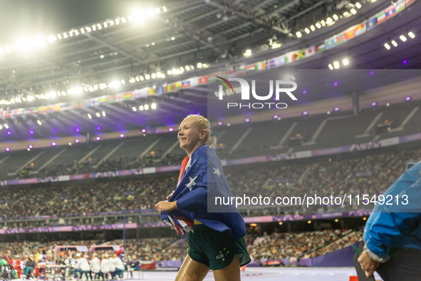 Vanessa Low of Australia reacts after winning the gold medal in the Women's Long Jump - T63 at Stade de France during the Paris 2024 Paralym...