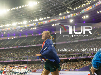 Vanessa Low of Australia reacts after winning the gold medal in the Women's Long Jump - T63 at Stade de France during the Paris 2024 Paralym...