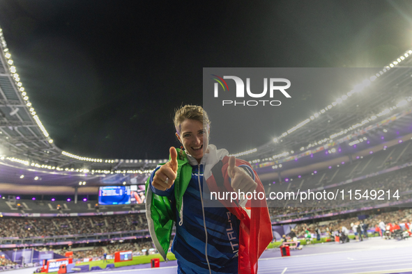 Martina Caironi of Italy reacts after the Women's Long Jump - T63 where she wins the silver medal at Stade de France during the Paris 2024 P...