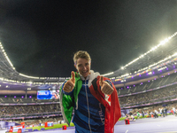 Martina Caironi of Italy reacts after the Women's Long Jump - T63 where she wins the silver medal at Stade de France during the Paris 2024 P...