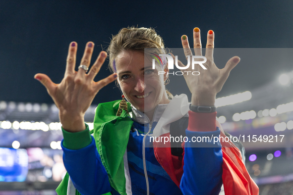 Martina Caironi of Italy reacts after the Women's Long Jump - T63 where she wins the silver medal at Stade de France during the Paris 2024 P...