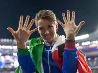 Martina Caironi of Italy reacts after the Women's Long Jump - T63 where she wins the silver medal at Stade de France during the Paris 2024 P...