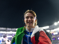 Martina Caironi of Italy reacts after the Women's Long Jump - T63 where she wins the silver medal at Stade de France during the Paris 2024 P...