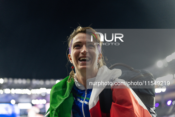 Martina Caironi of Italy reacts after the Women's Long Jump - T63 where she wins the silver medal at Stade de France during the Paris 2024 P...