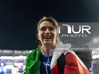 Martina Caironi of Italy reacts after the Women's Long Jump - T63 where she wins the silver medal at Stade de France during the Paris 2024 P...