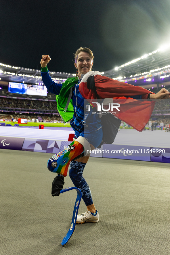 Martina Caironi of Italy reacts after the Women's Long Jump - T63 where she wins the silver medal at Stade de France during the Paris 2024 P...