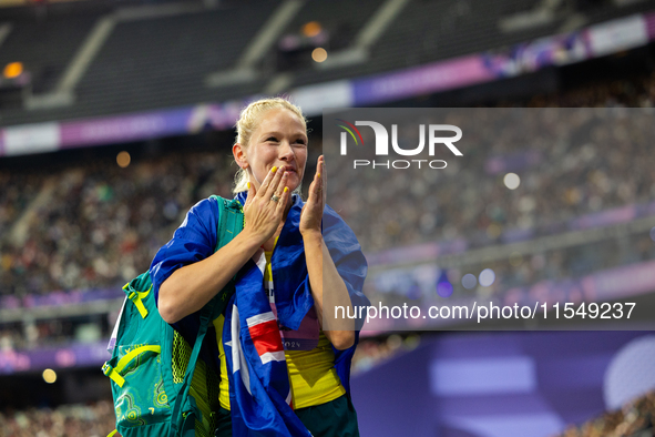 Vanessa Low of Australia reacts after winning the gold medal in the Women's Long Jump - T63 at Stade de France during the Paris 2024 Paralym...