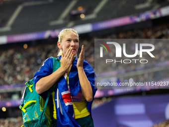 Vanessa Low of Australia reacts after winning the gold medal in the Women's Long Jump - T63 at Stade de France during the Paris 2024 Paralym...