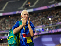 Vanessa Low of Australia reacts after winning the gold medal in the Women's Long Jump - T63 at Stade de France during the Paris 2024 Paralym...