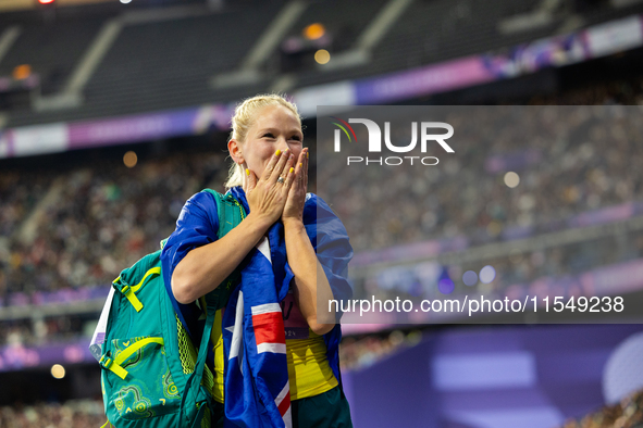 Vanessa Low of Australia reacts after winning the gold medal in the Women's Long Jump - T63 at Stade de France during the Paris 2024 Paralym...