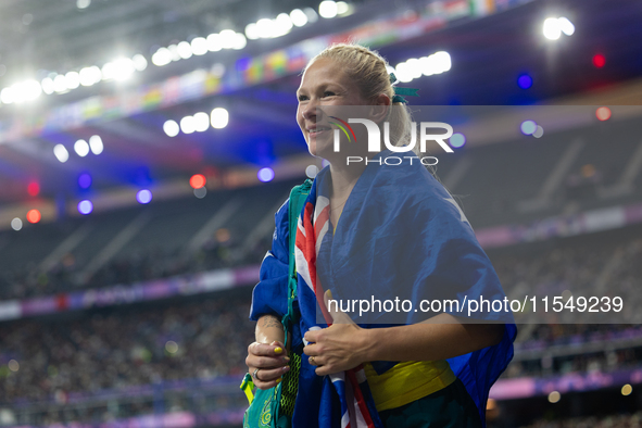 Vanessa Low of Australia reacts after winning the gold medal in the Women's Long Jump - T63 at Stade de France during the Paris 2024 Paralym...