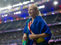 Vanessa Low of Australia reacts after winning the gold medal in the Women's Long Jump - T63 at Stade de France during the Paris 2024 Paralym...