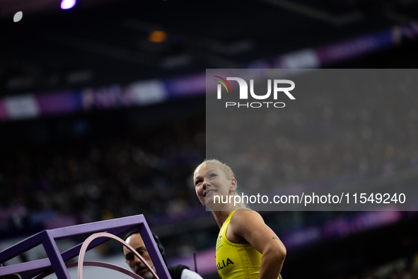 Vanessa Low of Australia reacts after winning the gold medal in the Women's Long Jump - T63 at Stade de France during the Paris 2024 Paralym...