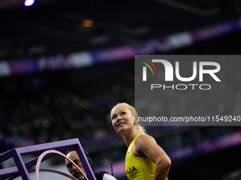 Vanessa Low of Australia reacts after winning the gold medal in the Women's Long Jump - T63 at Stade de France during the Paris 2024 Paralym...