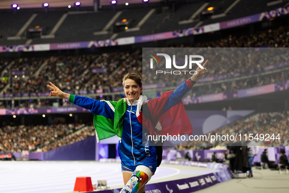 Martina Caironi of Italy reacts after the Women's Long Jump - T63 where she wins the silver medal at Stade de France during the Paris 2024 P...