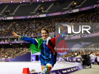 Martina Caironi of Italy reacts after the Women's Long Jump - T63 where she wins the silver medal at Stade de France during the Paris 2024 P...