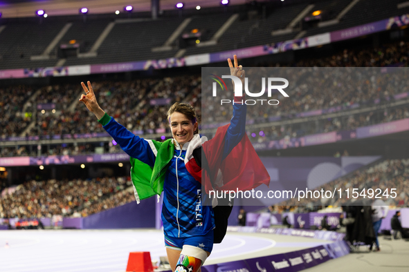 Martina Caironi of Italy reacts after the Women's Long Jump - T63 where she wins the silver medal at Stade de France during the Paris 2024 P...