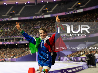 Martina Caironi of Italy reacts after the Women's Long Jump - T63 where she wins the silver medal at Stade de France during the Paris 2024 P...