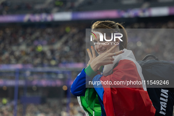 Martina Caironi of Italy reacts after the Women's Long Jump - T63 where she wins the silver medal at Stade de France during the Paris 2024 P...