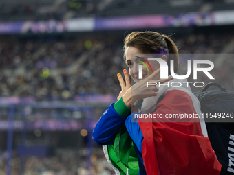 Martina Caironi of Italy reacts after the Women's Long Jump - T63 where she wins the silver medal at Stade de France during the Paris 2024 P...