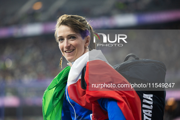 Martina Caironi of Italy reacts after the Women's Long Jump - T63 where she wins the silver medal at Stade de France during the Paris 2024 P...