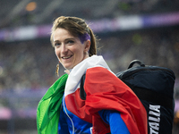 Martina Caironi of Italy reacts after the Women's Long Jump - T63 where she wins the silver medal at Stade de France during the Paris 2024 P...