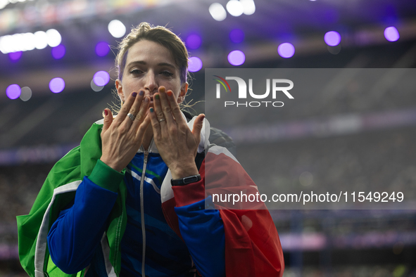 Martina Caironi of Italy reacts after the Women's Long Jump - T63 where she wins the silver medal at Stade de France during the Paris 2024 P...