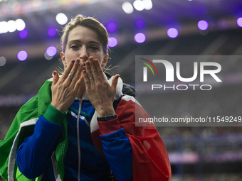 Martina Caironi of Italy reacts after the Women's Long Jump - T63 where she wins the silver medal at Stade de France during the Paris 2024 P...